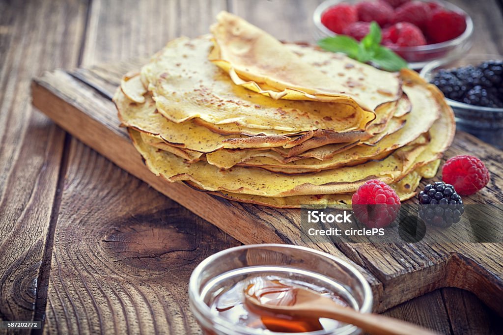 Pancake - Crepes with berries, mint and honey ... /file_thumbview/86451239/1 Crêpe - Pancake Stock Photo