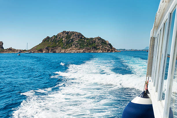 istock Waves on blue sea behind the boat 587204814