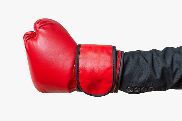 istock Hand of boxer in suit. Isolated on white background. 587205106