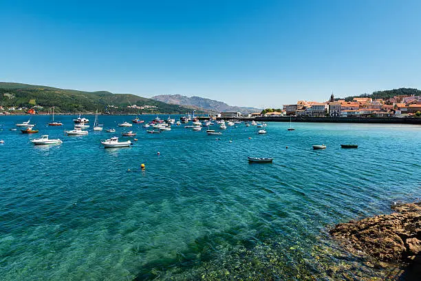 Wide-angle view of the sport port of Corcubion full of small motor boats, A Coruña, Spain.