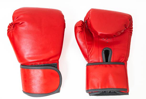 istock Pair of red boxing gloves isolated on white background. 587205836