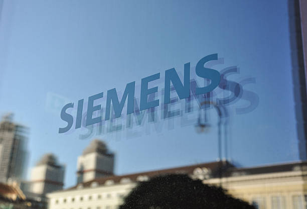 Siemens logo at door of new headquarters - Munich, Germany stock photo