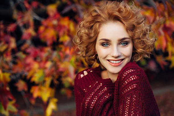 autumn photo of a beautiful girl - beautiful red hair curly hair human hair imagens e fotografias de stock