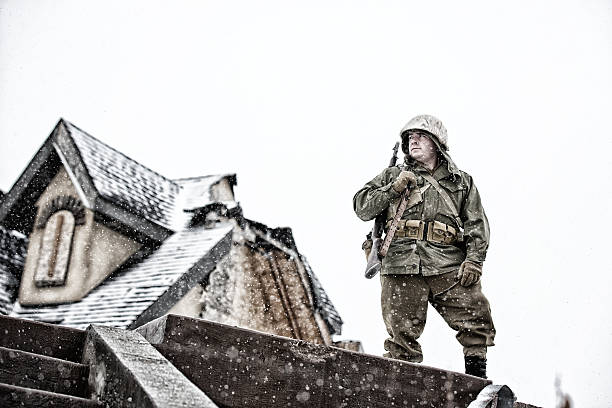 istock WWII GI Standing On Watch In Front of Bombed Manor 587207290