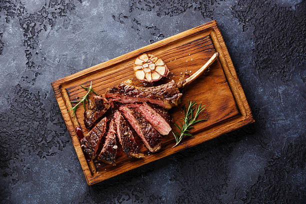 istock Sliced grilled Steak on bone Veal rib 587207526