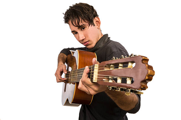 istock Lead guitarist. Isolated on the white background. 587209128