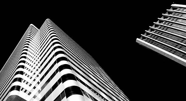 istock Highrise Skyscraper, Modern Futuristic Facaid, Black/White Landscape Format, Dutch Angle 587209782