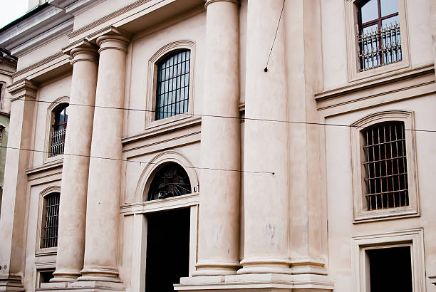 istock Pale facade of the church 587210654