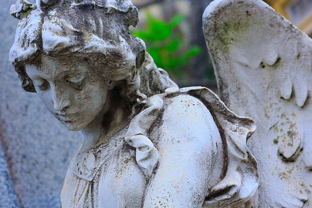 young sad, beautiful fragile madonna angel, recoleta cemetery, buenos aires - serafijn stockfoto's en -beelden