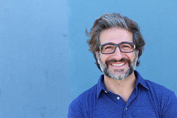 istock Good looking businessman with glasses smiling 587214630