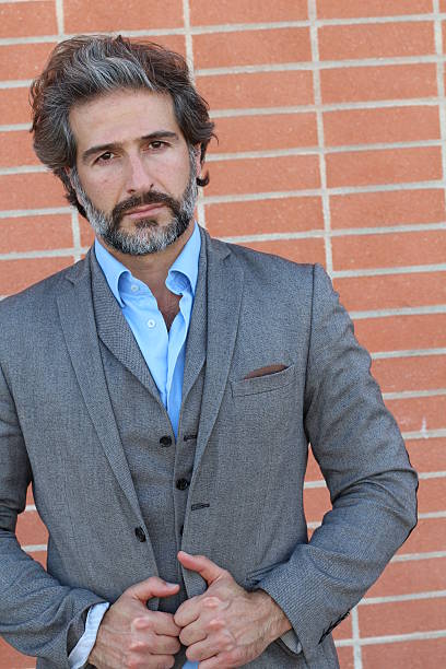 istock Handsome man wearing an elegant outfit 587215688