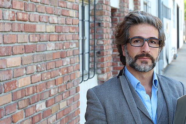 istock Handsome natural bearded man with glasses 587216470