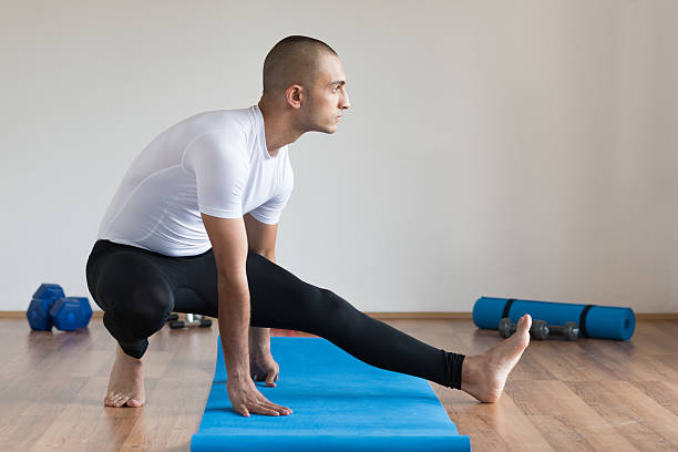 istock Man in sports clothes stretching after a workout. 587216490
