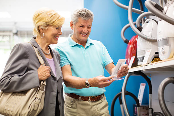 istock Senior couple shopping for home appliances 587216526