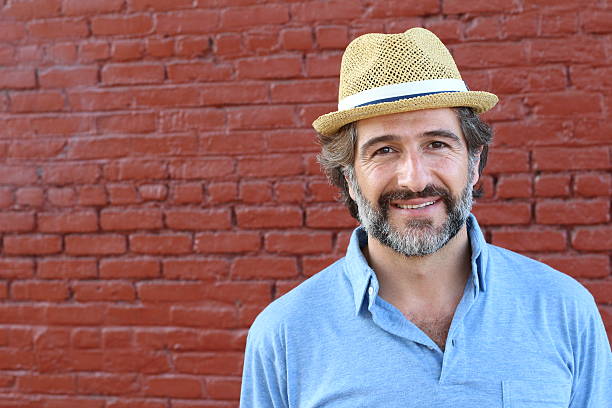 istock Portrait of smiley middle aged hipster man 587217384