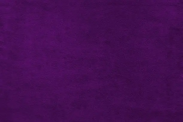Photo of Violet color velvet texture background