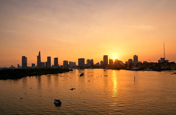 istock Downtown Saigon at sunset- biggest city in Vietnam. 587219528