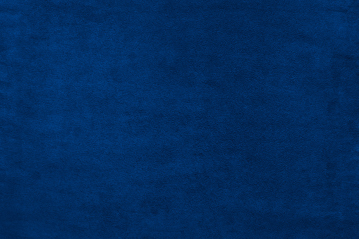 Fondo de textura de terciopelo de color azul photo