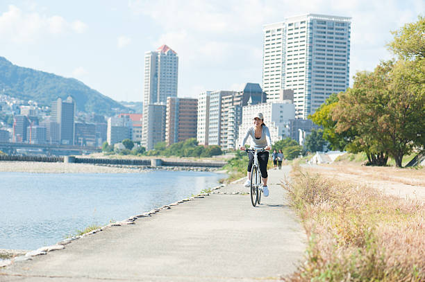 istock Woman riding a bicycle 587221026