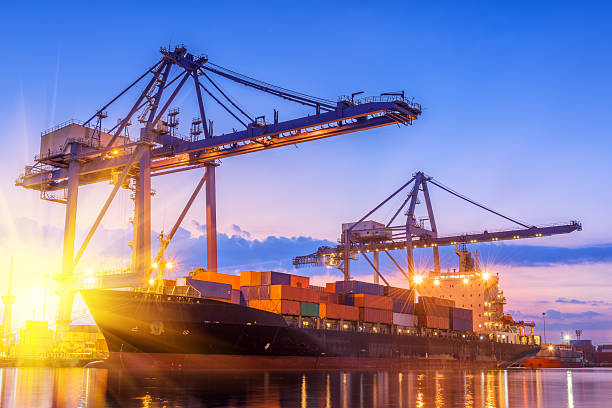 istock Twilight scene beside of the cargo ship terminal. 587221750