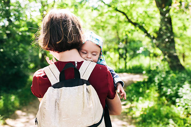 istock young family with a child on the nature 587224366