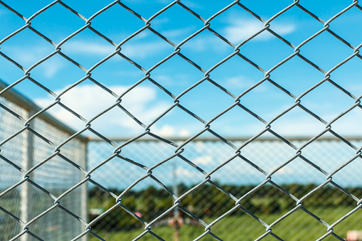fence with metal grid in perspective