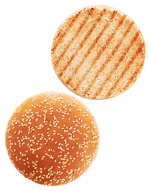 Grilled burger bun isolated on white background.