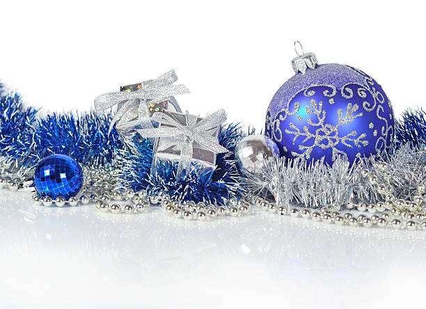 istock Blue and silver Christmas decorations on a white 587226956