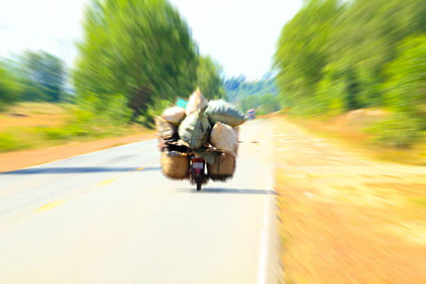 Overload motorcycle speeds on the road. stock photo