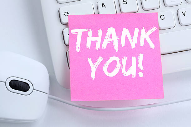 istock Thank you on notepaper office business concept 587229402