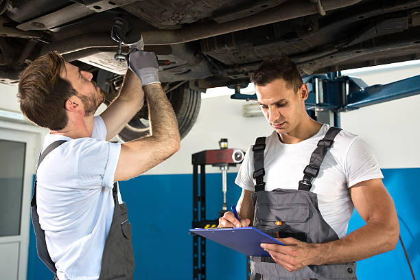 istock Fixing the car with wrench 587230568