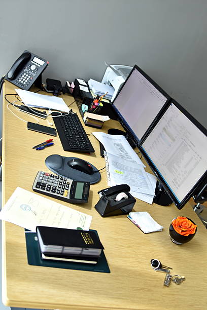 istock busy office desk with all items at the work 587231040