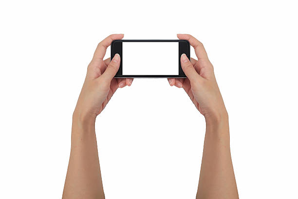 istock Hand holding smart phone isolated white background, use clipping 587231204