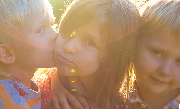 istock Shildren kissing 587506352