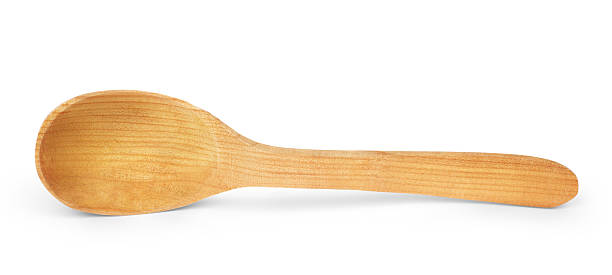 istock Close up wooden spoon isolated on white, with clipping path 587508452