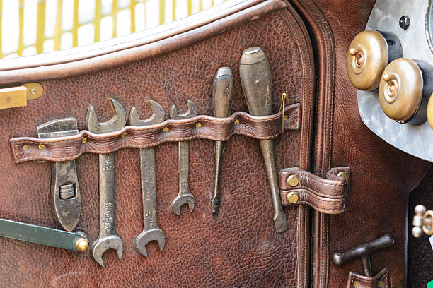 Bentley classic car toolkit Jüchen, Germany - August 1, 2014: Toolkit inside the door of a vintage 1920s Bentley race car on display during the 2014 Classic Days event at Schloss Dyck. racecar photos stock pictures, royalty-free photos & images