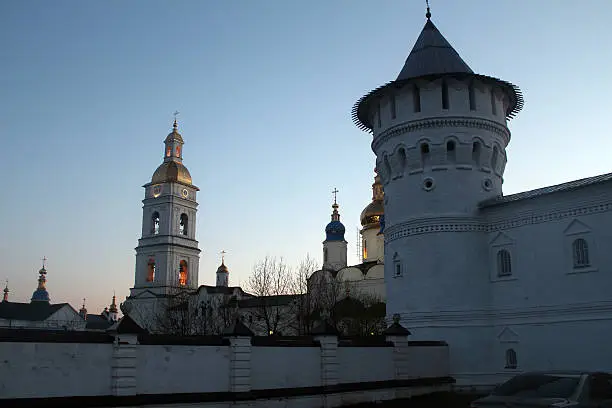 Towers of Tobolsk kremlin and a church in the evening