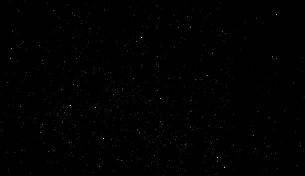 istock Real dark night sky with plenty of stars 587515424