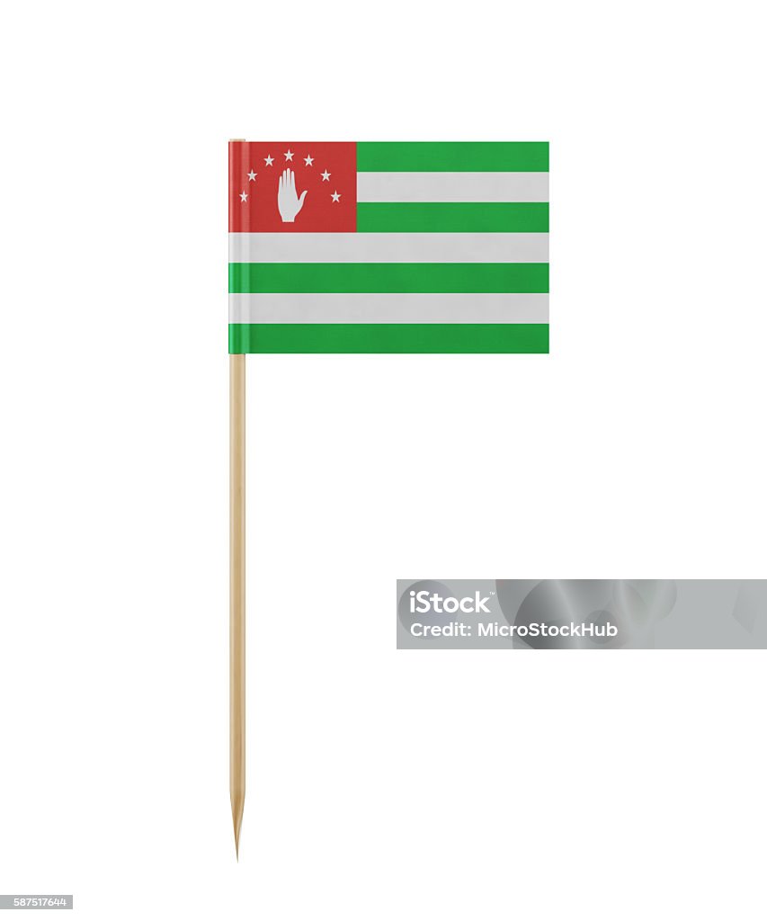 Tiny Abkhazia Flag on a Toothpick Tiny Abkhazia flag  on a toothpick. The flag has nicely detailed paper texture, High quality 3d render. Isolated on white background. Clipping path is included.  Abkhazia Stock Photo
