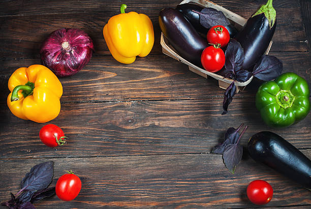 istock Composition with variety of raw fresh vegetables 587518120