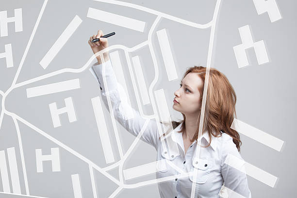 istock Future technology, navigation, location concept. Woman showing transparent screen with 587519508