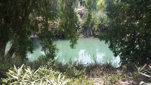 istock baptismal site on the Jordan River in Israel 587519738