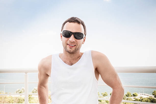 istock Young sporty smiling Caucasian man 587521522