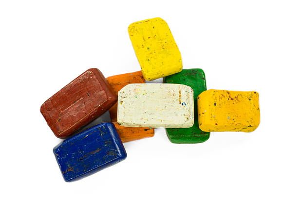 istock Heap of colorful wax crayon 587522110