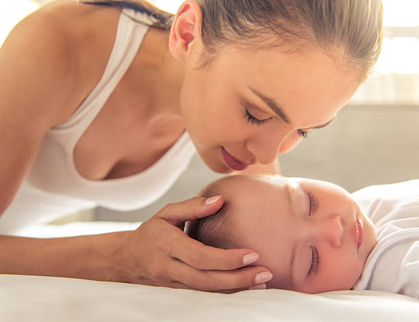 istock Mom and baby 587522600