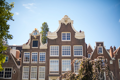 Cityscape of the picturesque town of Enkhuizen with the church tower of the Zuiderkerk in the background.