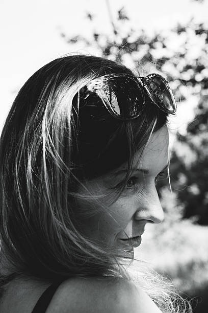 istock woman portrait with sunglasses 587525030