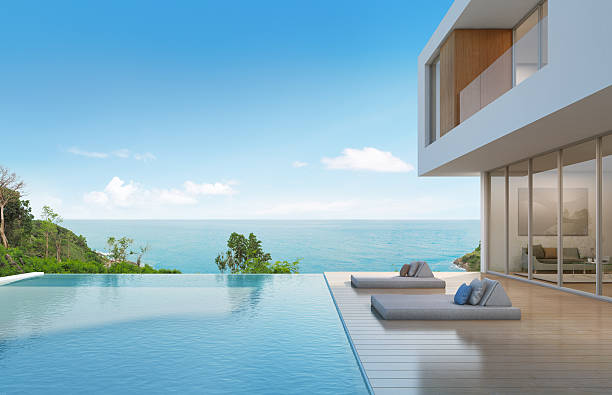 현대적인 디자인의 수영장이있는 비치 하우스 - mansion luxury house swimming pool 뉴스 사진 이미지