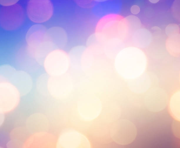 istock Colorful circles of light abstract background 587531150