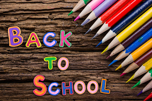 istock Back to School desk table top view, words on grunge 587534370